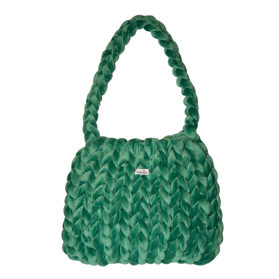 teal Green textured tote bag with braided handle on a white background. hand knitted and crocheted together.
